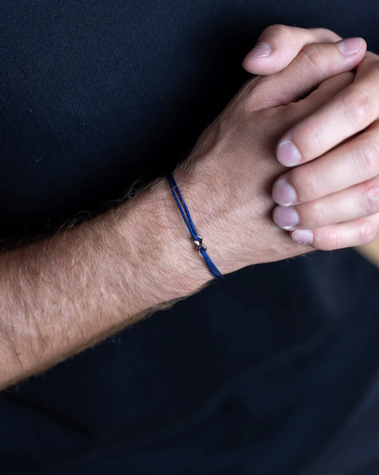 1.5mm Blue nylon bracelet with a silver-plated Infinity sign