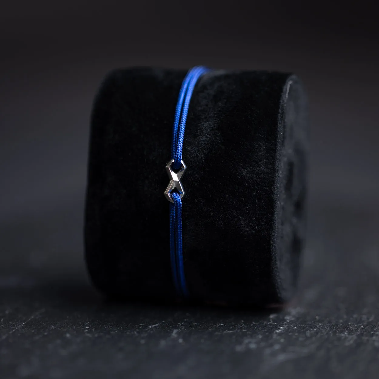 1.5mm Blue nylon bracelet with a silver-plated Infinity sign