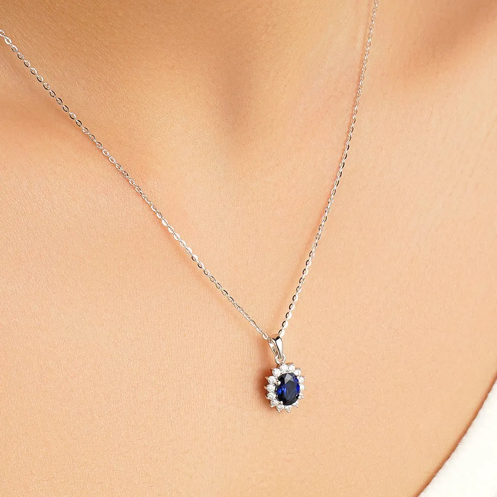 1.64 CT. Floral Halo Oval Sapphire Pendant